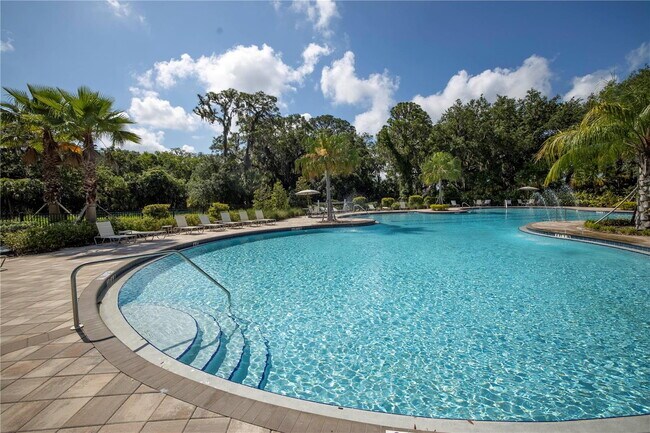 Building Photo - Open Floor Plan! Nice corner lakefront home!  Community pool, playground and walking trails.