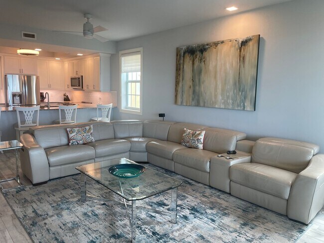 Building Photo - Coastal Luxury at Hidden Bay | 3BR Waterfront Condo with Bay Views