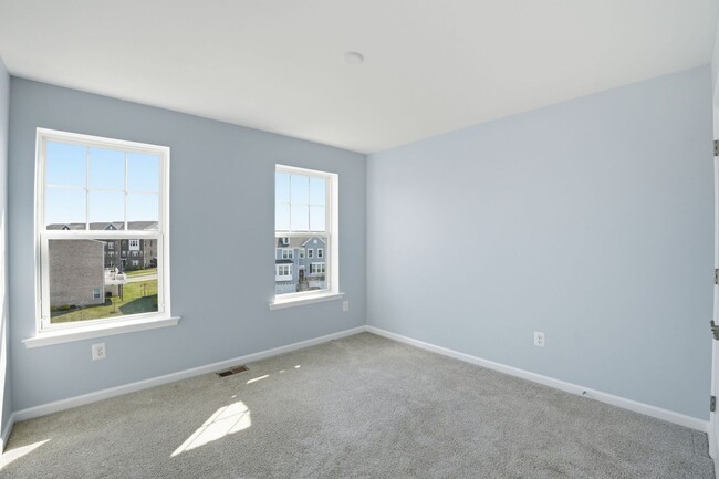 Building Photo - Experience refined, contemporary living in this nearly new residence designed for both comfort an...