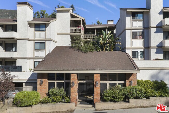 Building Photo - 3480 Barham Blvd
