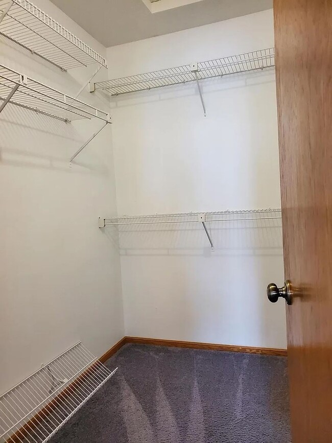 Building Photo - Two Bedroom Townhouse W/ Views Of Rice Lak...