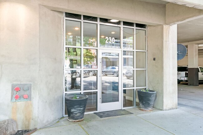 Building Photo - 2BR Condo w/ Covered Parking and Balcony Views at Broadway Towers