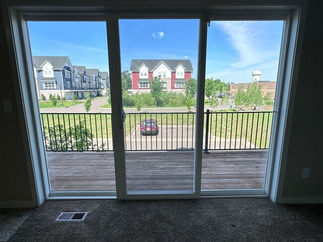Building Photo - Champlin Corner Unit Town Home, 2 Car Garage, Dishwasher, Washer/Dryer, Balcony