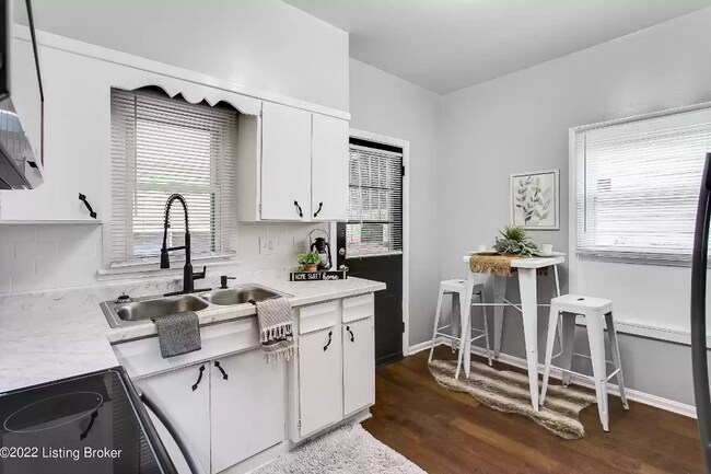 Cottage style kitchen - 3100 Montana Ave