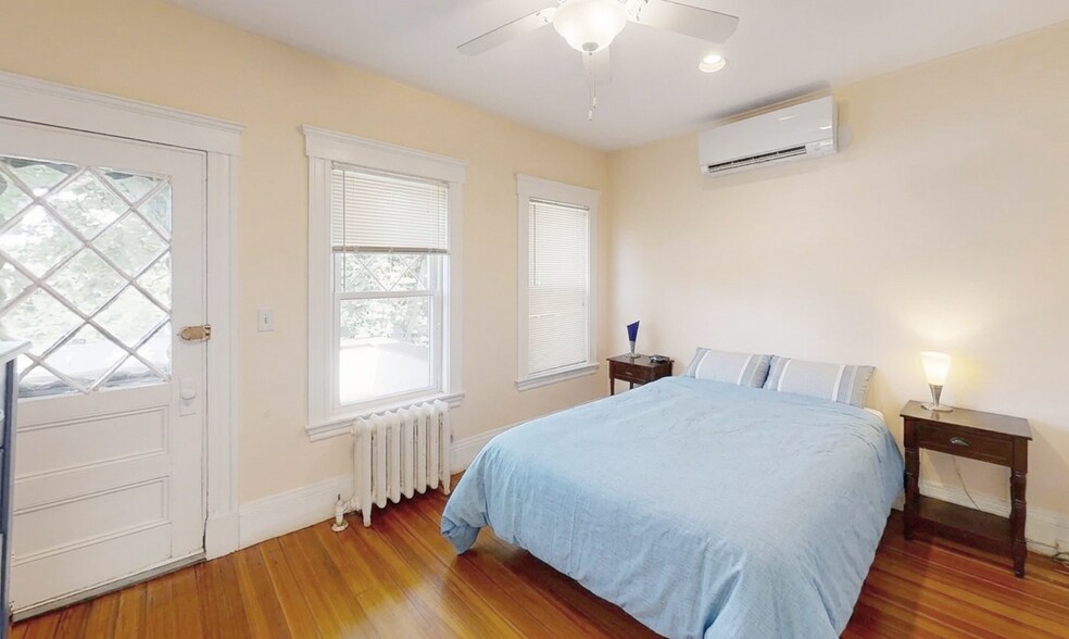 Bedroom #1 with closet, two windows and connected front porch. - 307 Tappan St