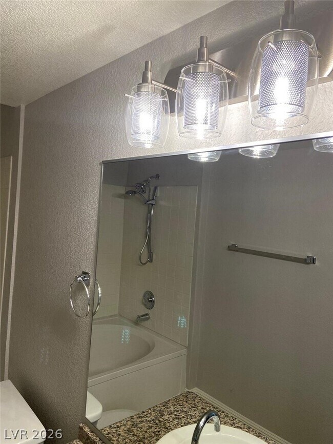 Building Photo - 5055 W Hacienda Ave