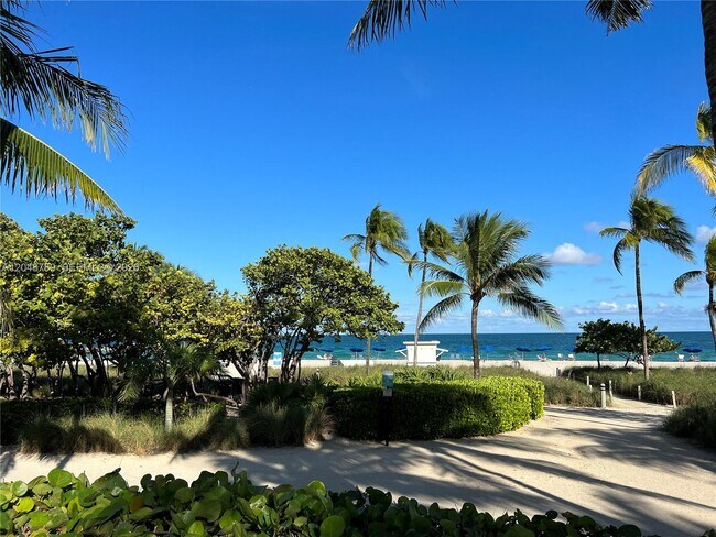 Building Photo - 10275 Collins Ave