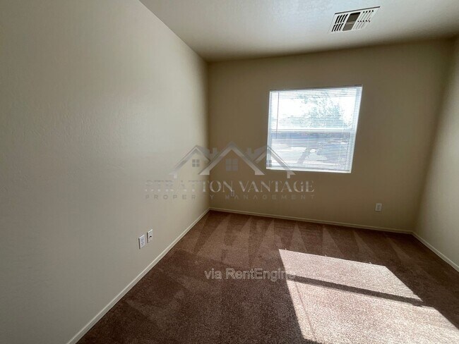 Building Photo - 11580 W Duran Ave