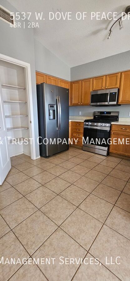 Building Photo - 5537 W Dove of Peace Dr