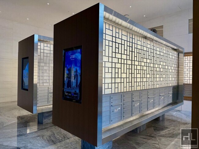 Building Photo - SUNNY NO FEE STUDIO IN THE LUXURY SUMMIT NYC
