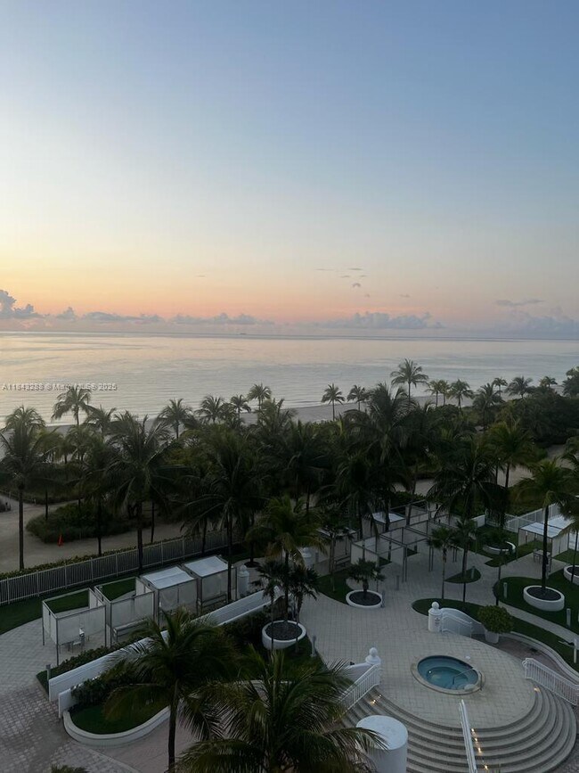 Building Photo - 10275 Collins Ave