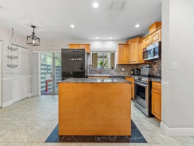 Building Photo - 14474 SW 144th Terrace