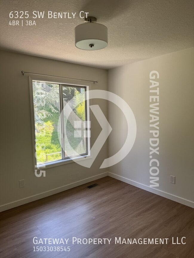 Building Photo - 6325 SW Bently Ct