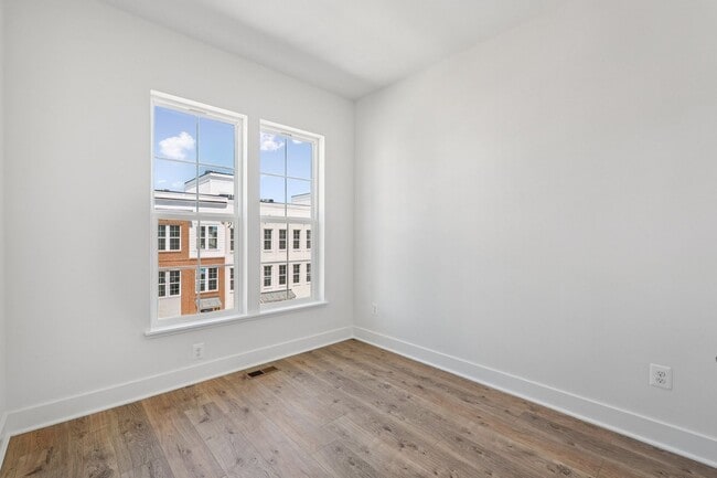 Building Photo - Brand New 4 Bedroom, 3.5 Bath Townhome in ...