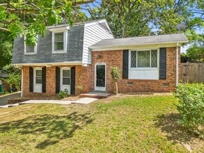 Building Photo - Large Home in Four Seasons Area, Hardwoods, Dining Room, Screed Porch, Fenced!