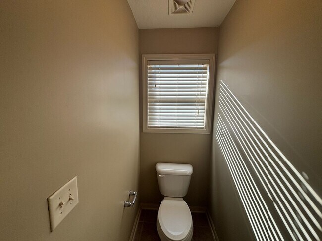 Building Photo - This property blends ample living space and storage with functional amenities.