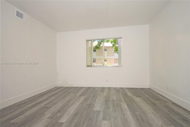 Building Photo - 301 Gardens Dr