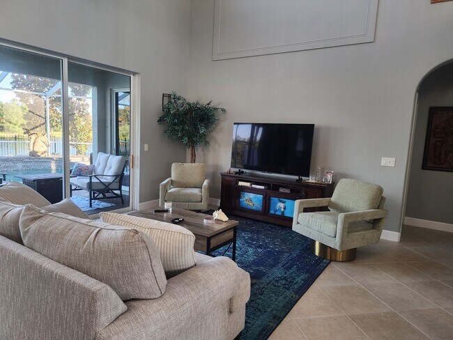 Building Photo - NORTH PORT - Rare Waterfront 4 bedroom pool home Annual/Unfurnished