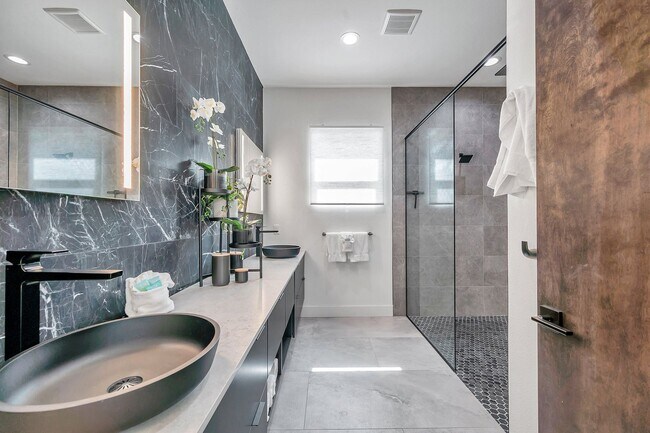 Building Photo - Luxury Living in Grand Central District: Exquisite Furnished Home with Pool