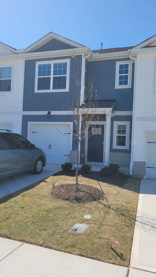 Building Photo - Beautiful New Townhome for Military Tenant
