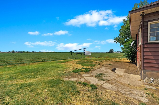 Building Photo - Check Out This 2 Bedroom Farm Home!