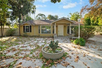 Building Photo - Tucked away behind gorgeous grand gates is this beautifully updated 3 bedroom 2 bath home