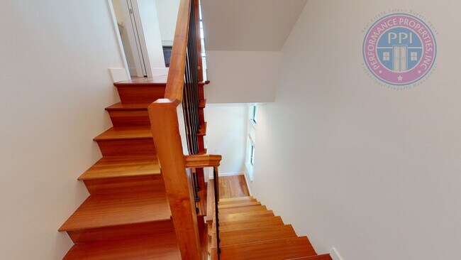 Building Photo - Riverfront Location, Luxury Townhome - End Corner Unit, Two En-Suites, Attached Garage