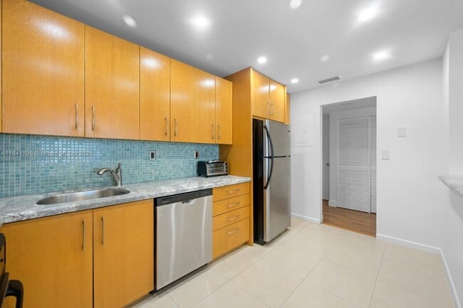 Building Photo - 19380 Collins Ave