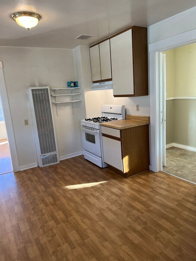 Building Photo - Fenced Yard - Laminate Flooring - Mid-Town - Extra Outside Storage