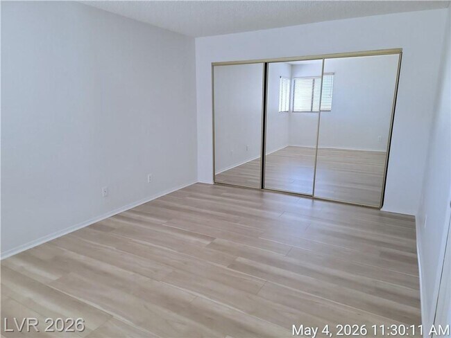 Building Photo - The Lakes Home with No Carpet, Fireplace & Covered Patio