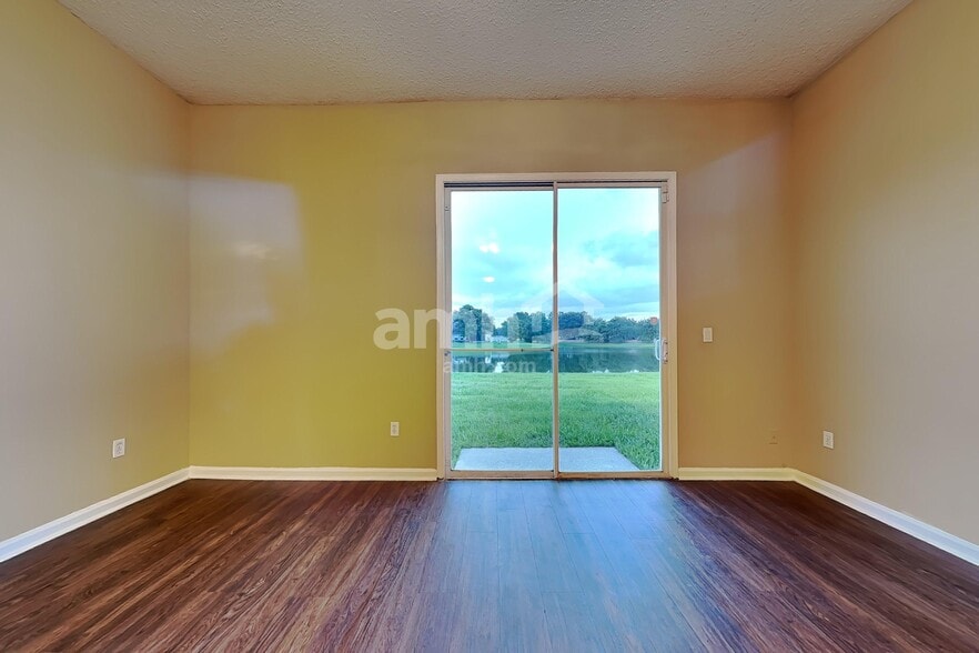 Building Photo - 7093 Rapid River Dr W