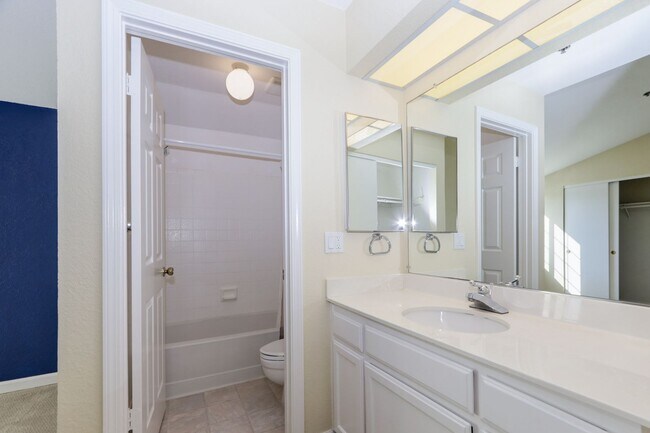 Building Photo - 3BR/3BA Pet-Friendly Village In The Park Townhome with Pool & 2-Car Garage | YouTube Tour