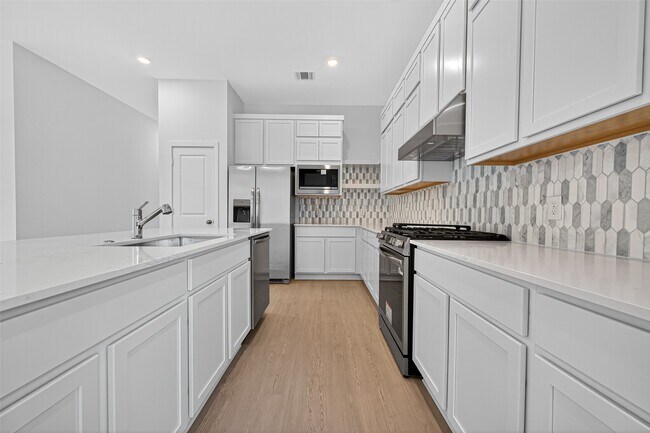 Building Photo - 27423 Sunterra Village Dr