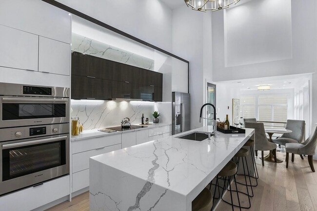 Building Photo - Private Double Decker Rooftop! - Modern Lu...