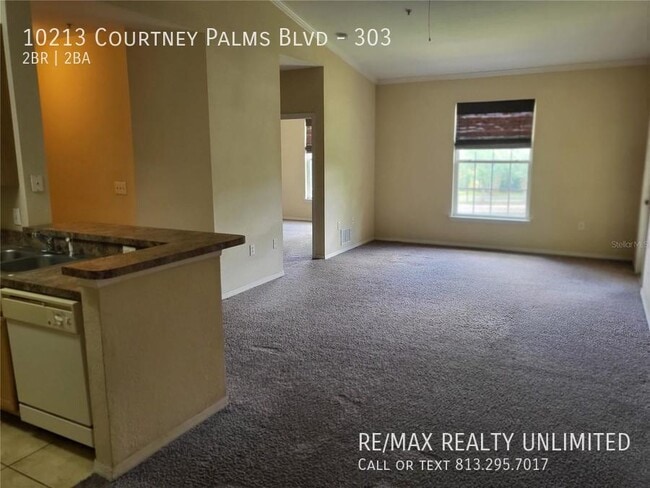 Building Photo - 10213 Courtney Palms Blvd