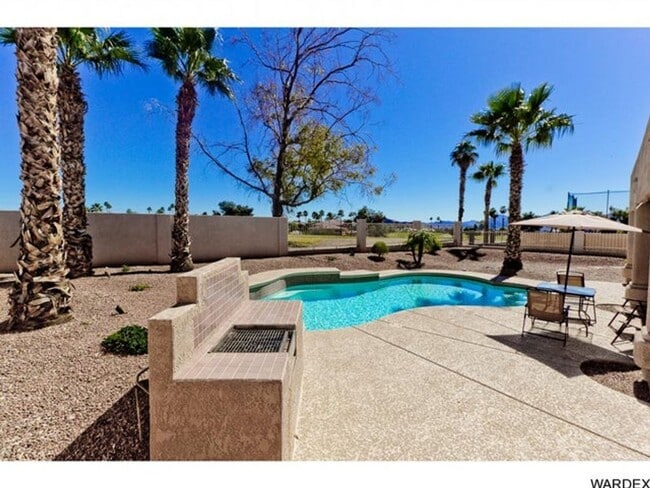 Building Photo - *REDUCED PRICE* Long Term - Unfurnished- Beautiful Golf Course Pool Home!!