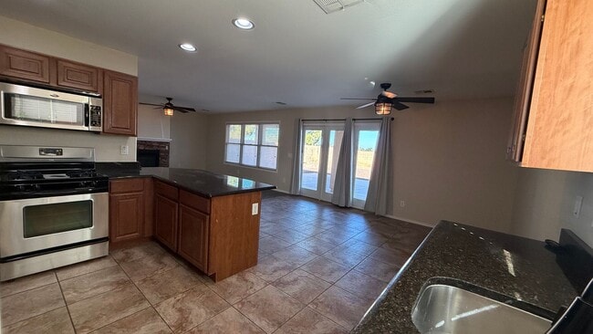 Building Photo - Spacious Surprise home with large backyard