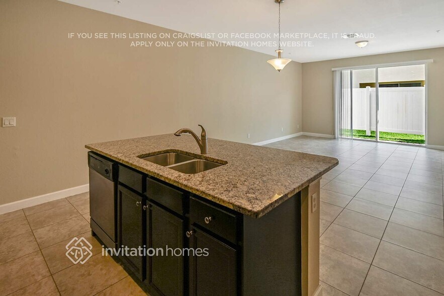 Building Photo - 9495 SW Merlin Ct