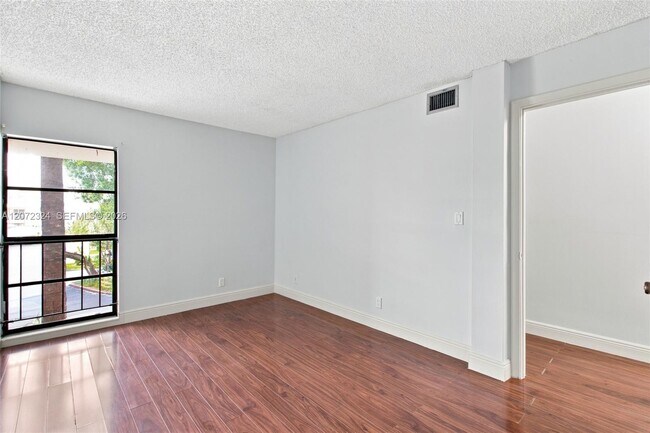 Building Photo - 6511 Racquet Club Dr