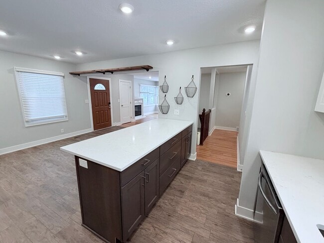 Building Photo - Spacious 4-Bedroom Home with Pond Views & EV-Ready Garage – Bloomington!!