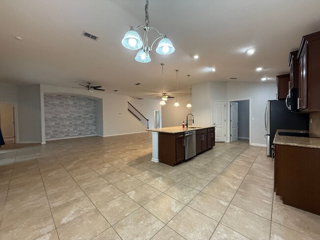 Building Photo - Spacious 5-Bedroom Retreat with Gourmet Ki...