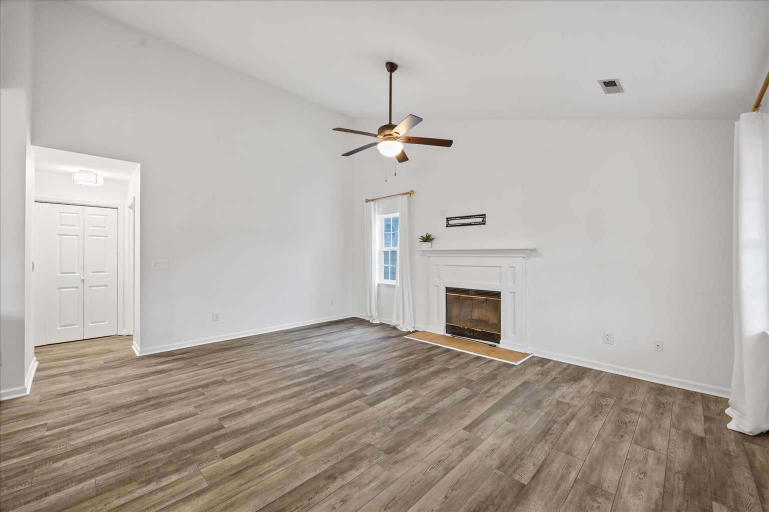Great room with wood burning fireplace - 2204 Loblolly Ct