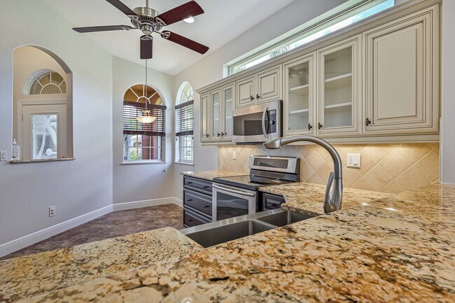 Building Photo - ** Immaculate,  3 Bed/2 Bath Lake Front Pool Home in Naples ~ Available NOW**