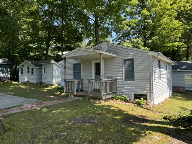 Unit is adjacent to the laundry cabin - 9R Lake Dr