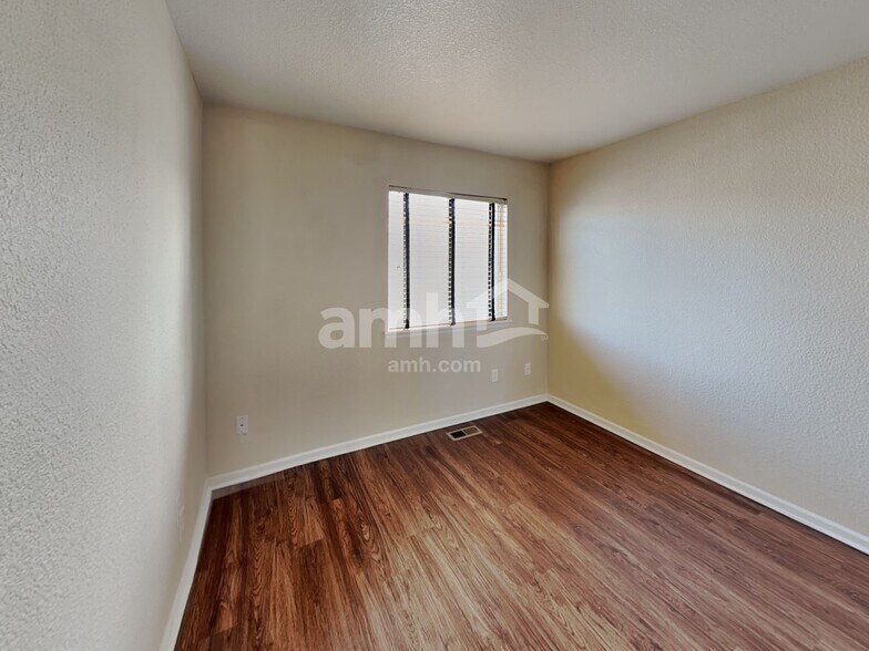 Building Photo - 19746 E 50th Ave