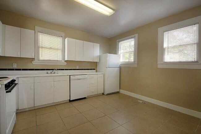 Building Photo - Upgraded and ready 5 bed 2 bath home next door to the 3 bed 2 bath home