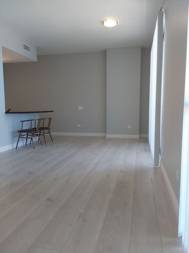 Building Photo - Stunningly Remodeled Studio High-Rise Unit...