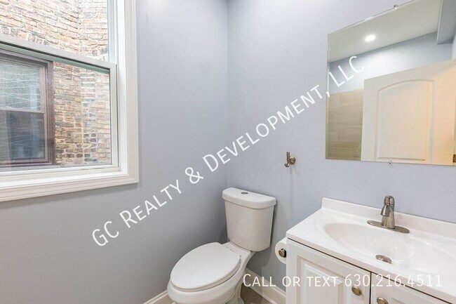 Building Photo - 6433 S Vernon Ave