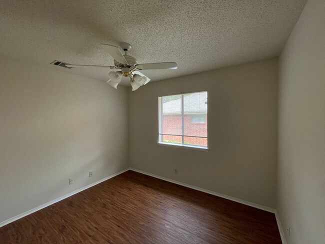 Building Photo - SPACIOUS HOME - NEW FLOORING! - 2 LIVING A...