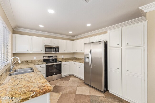 Building Photo - 7420 W Los Gatos Dr